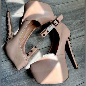 Nude high heels with studs
